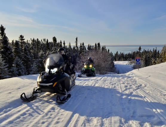Snowmobilers on the Trans-Québec 3 trail in Côte-Nord